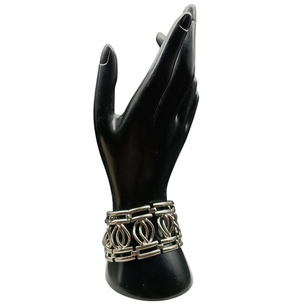 Vintage Silver-Tone Wide Cuff Bracelet With Intricate Openwork Design